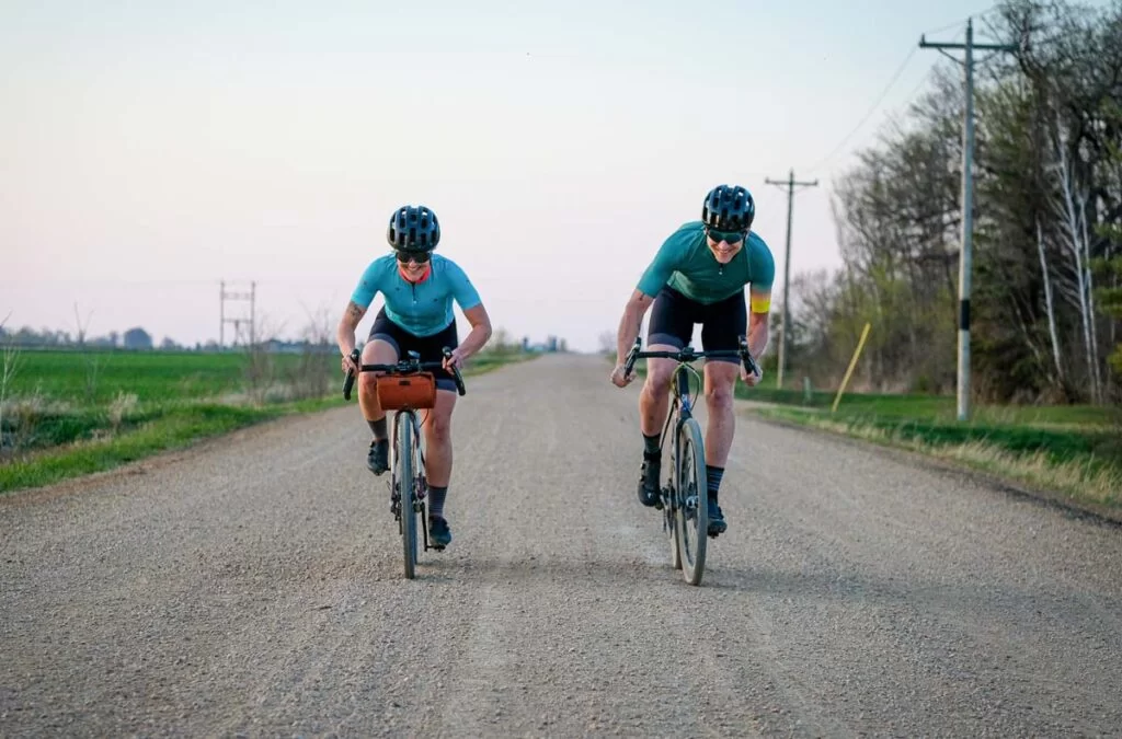 2 riders sprinting ahead